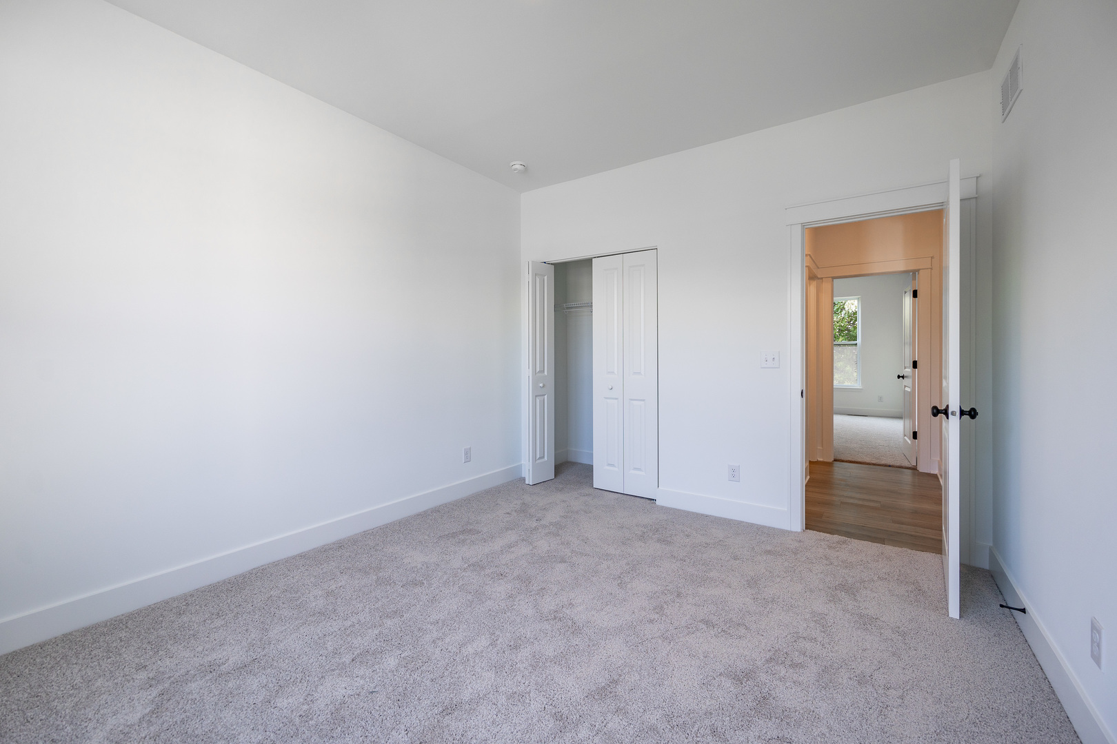283 Wild Prairie Pointe Hampshire, IL 60140 - Photo 26 of 32 an empty room with an entrance and closet