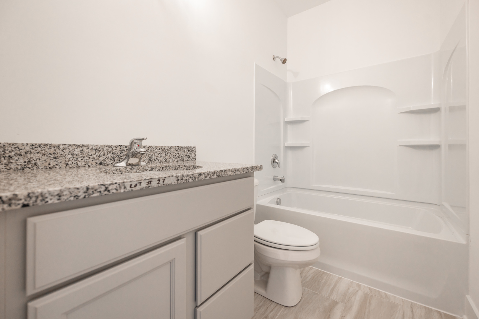 283 Wild Prairie Pointe Hampshire, IL 60140 - Photo 27 of 32 a bathroom with a toilet a sink and a bathtub