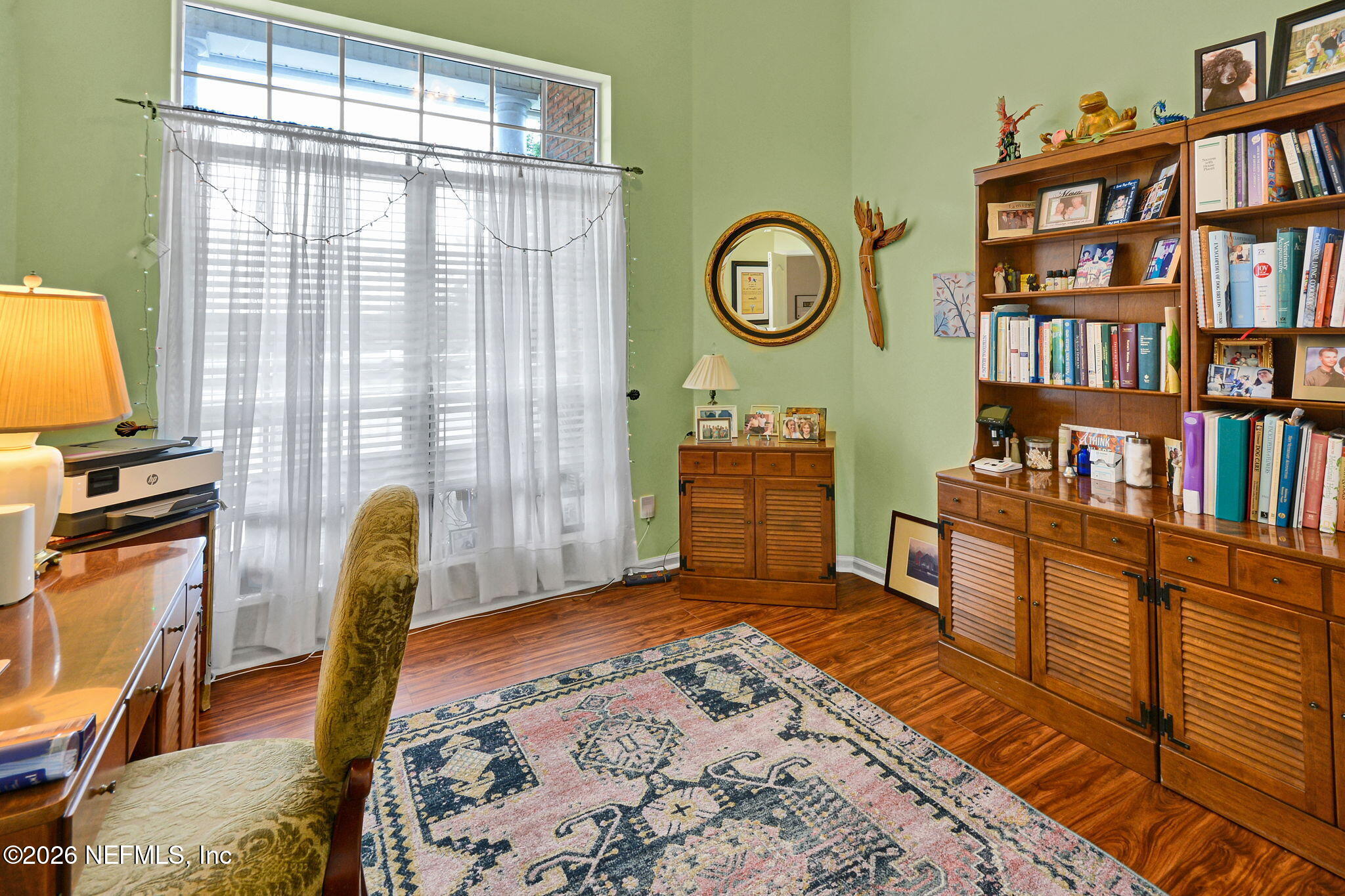 5950 West Shores Road Orange Park, FL 32003 - Photo 11 of 42 a bedroom with furniture and a window