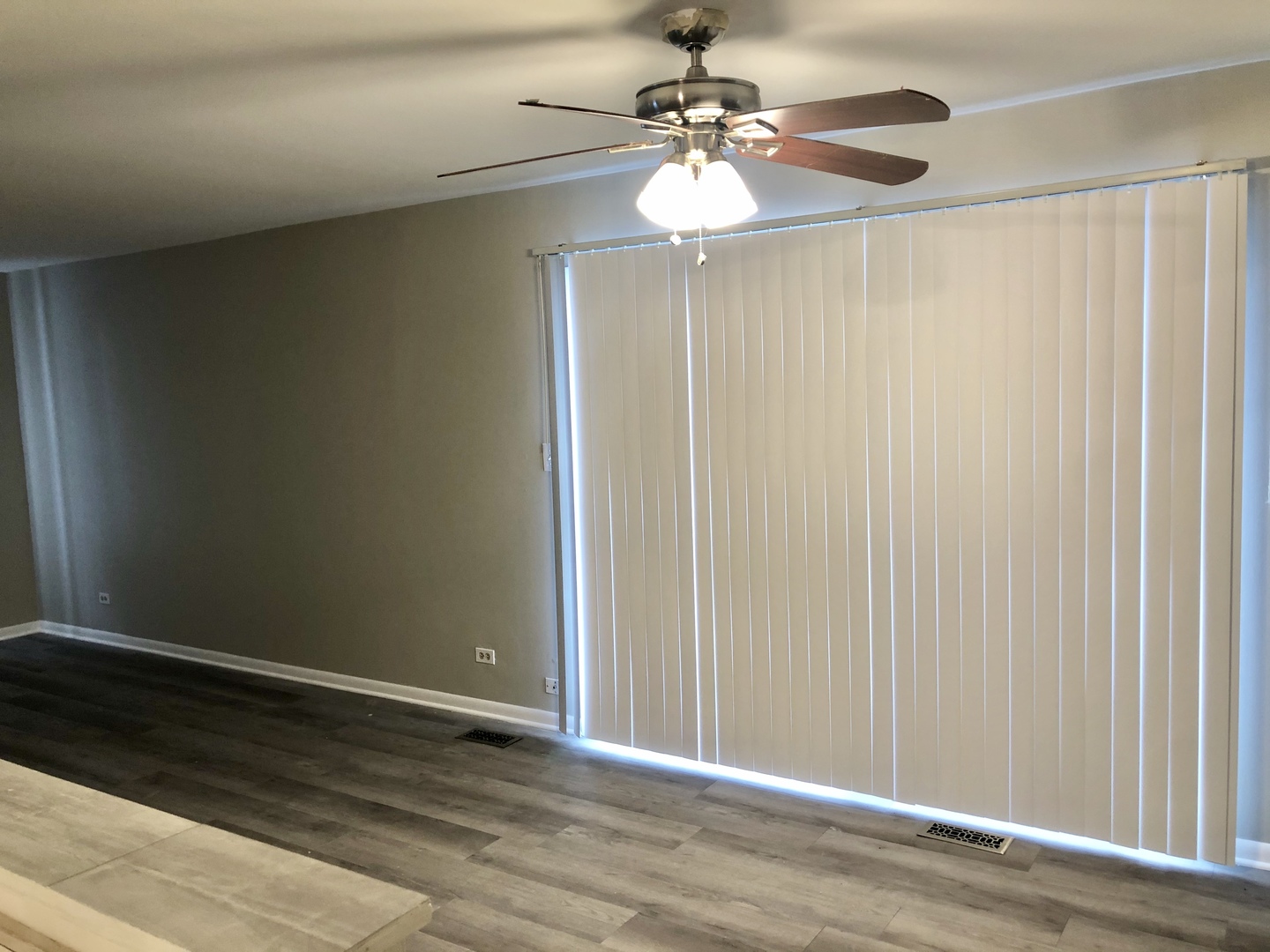 1769 Raleigh Lane Hoffman Estates, IL 60169 - Photo 14 of 17 a view of an empty room with wooden floor
