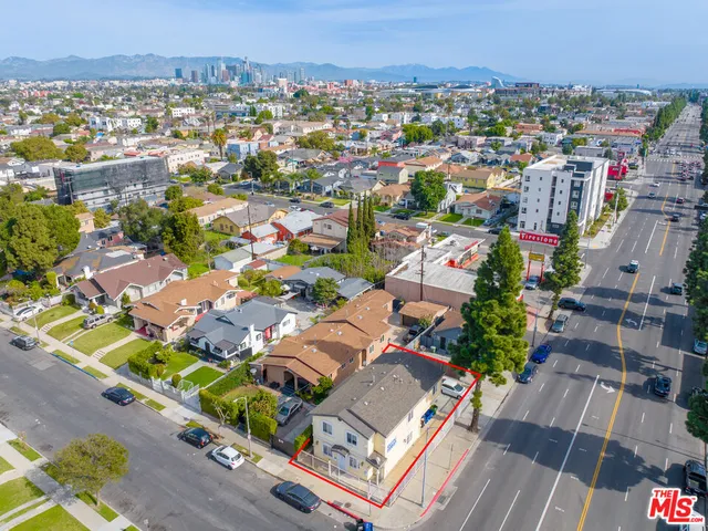 an aerial view of a city with lots of residential buildings
