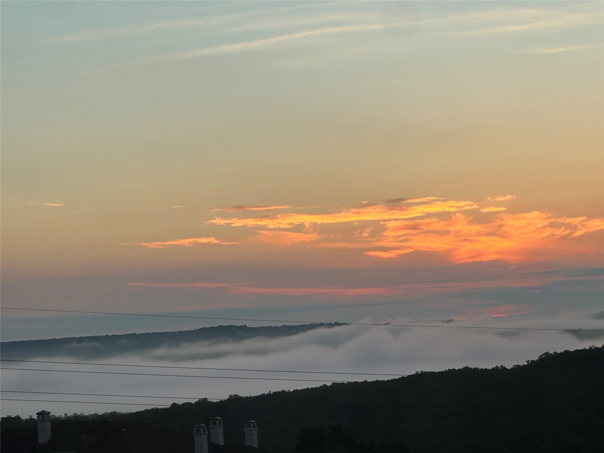 608 Marly Way, Unit 5 Austin, TX 78733 - Photo 2 of 30 Morning Sunrise & clouds view from first floor