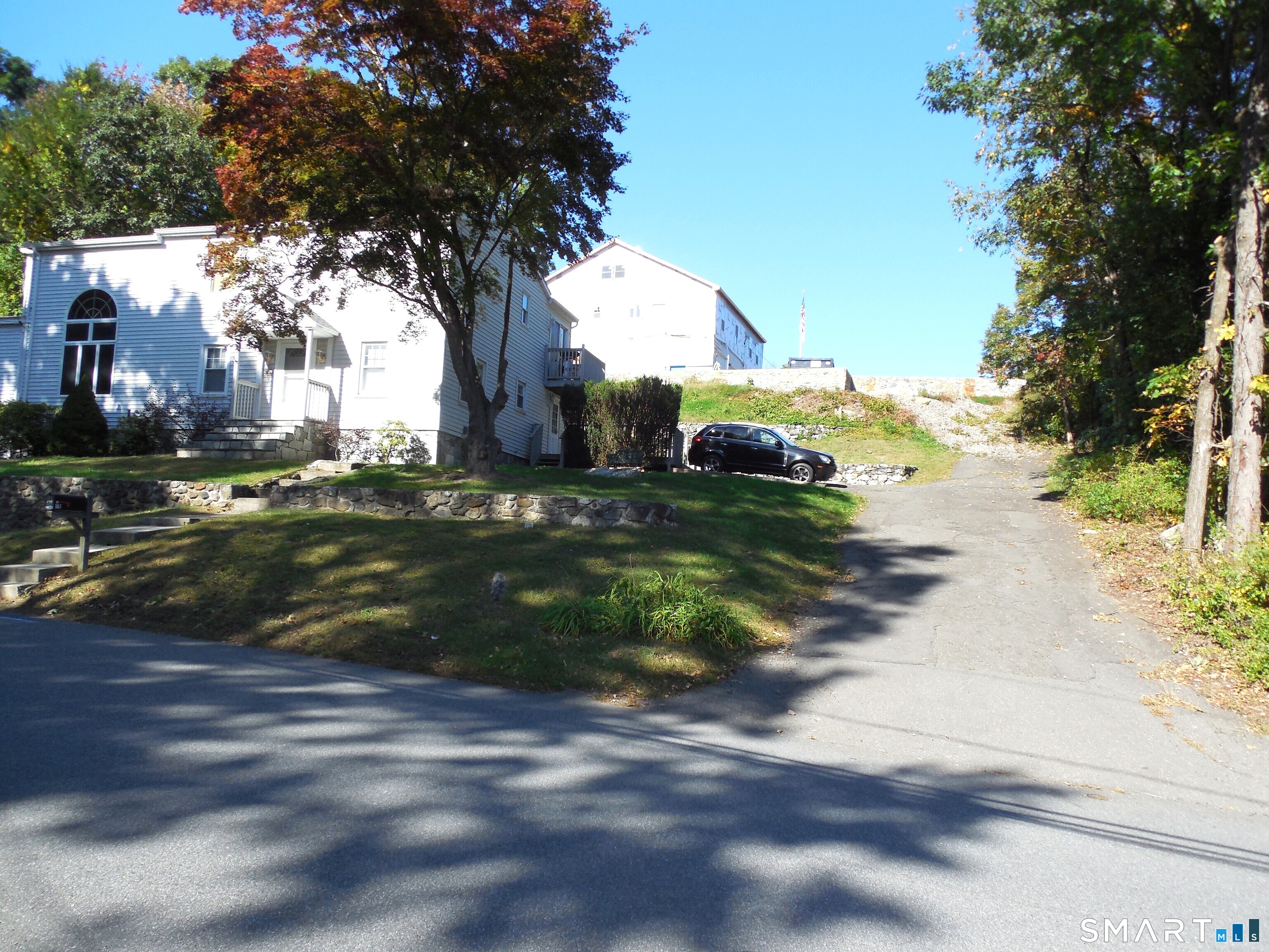 70 Wooster Avenue Waterbury, CT 06708 - Photo 22 of 22 Right Side Driveway to the Apartment.