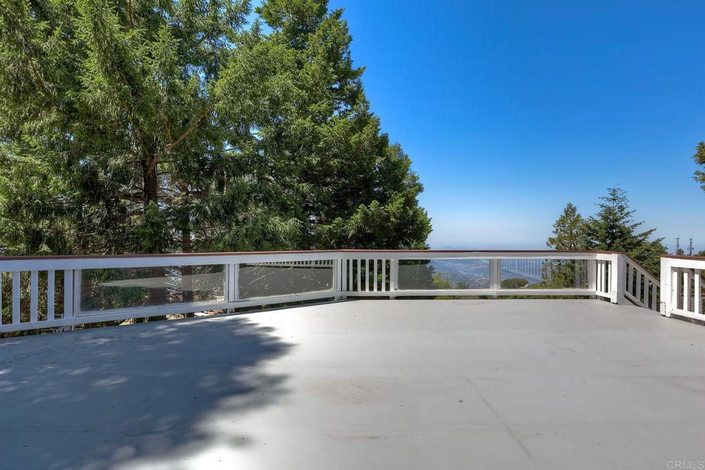 22223 Crestline Road Palomar Mountain, CA 92060 - Photo 15 of 90 a view of a house with backyard and sitting area