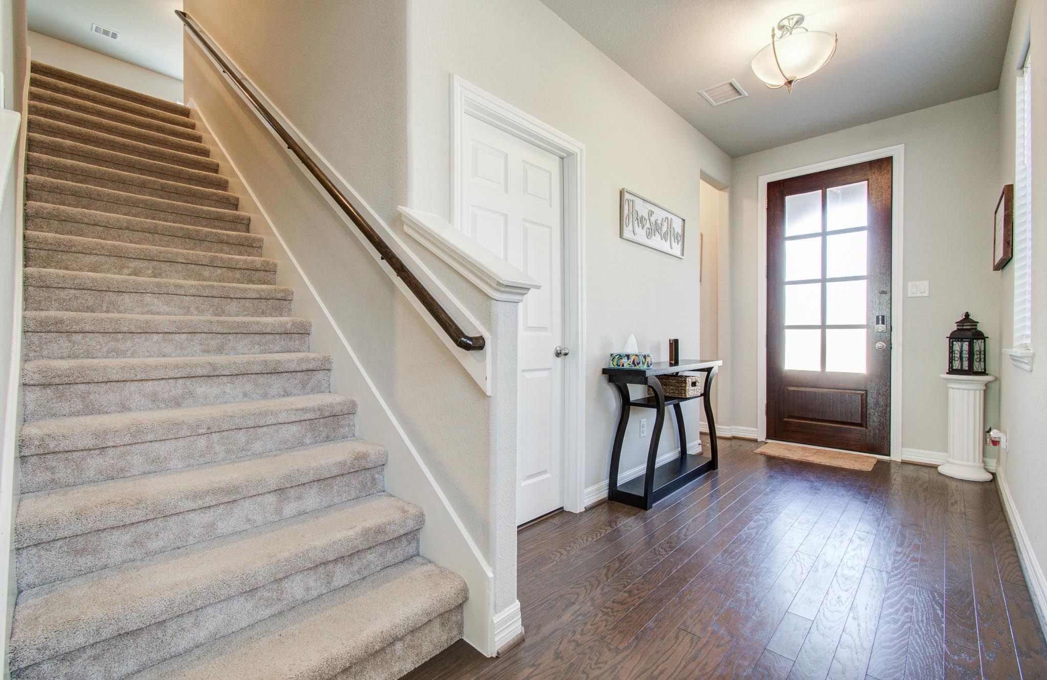 10317 Russell Pines Drive Rosharon, TX 77583 - Photo 4 of 33 a view of entryway with wooden floor and stairs