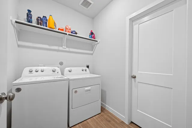 a utility room with dryer and washer