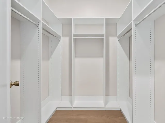 a view of an empty walk in closet