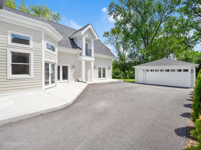 a view of a house with a street