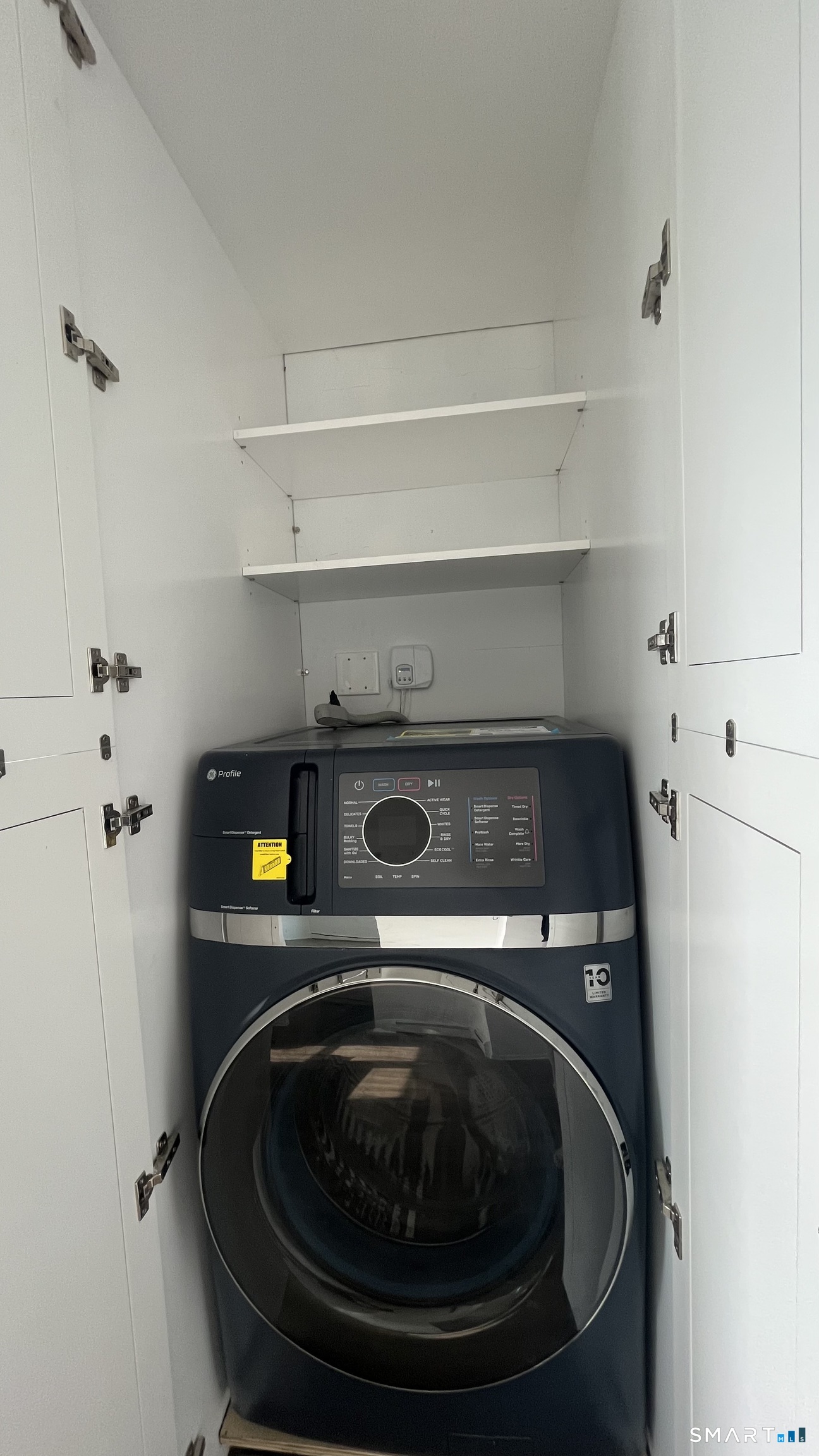 34 Keith Street, Unit 2 Stamford, CT 06902 - Photo 15 of 15 a utility room with washing machine
