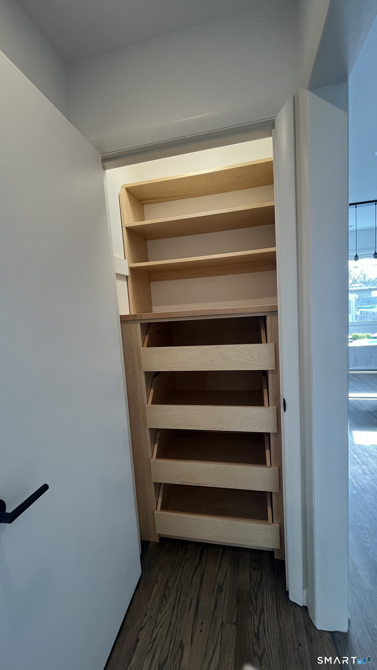 34 Keith Street, Unit 2 Stamford, CT 06902 - Photo 5 of 15 a view of walk in closet with empty racks