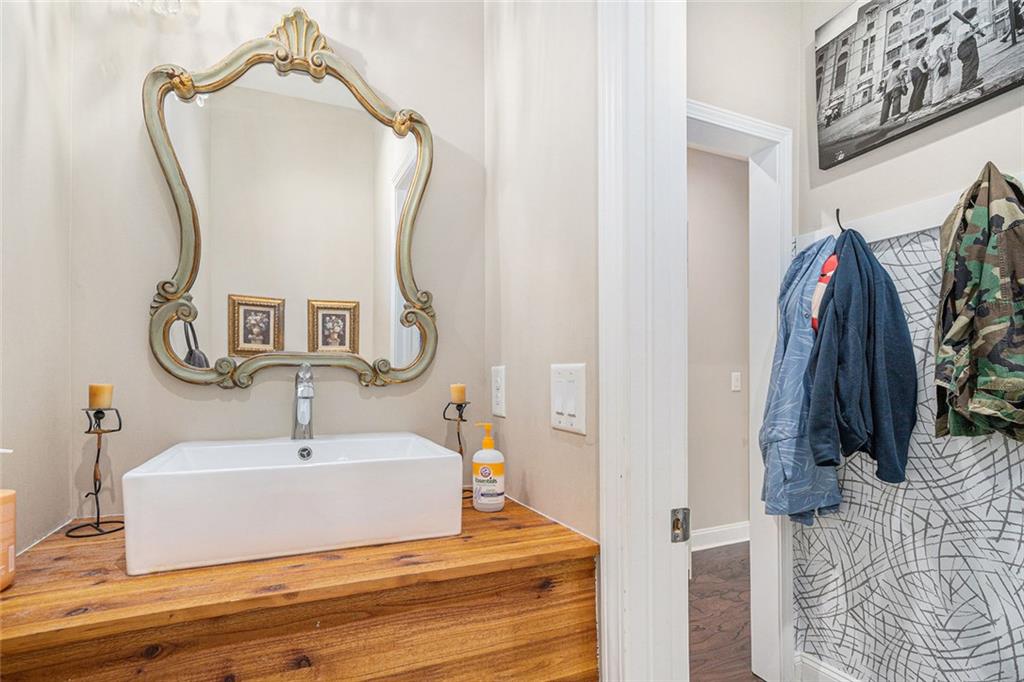 85 Jane Harris Road Dallas, GA 30157 - Photo 12 of 33 a bathroom with a sink and a mirror