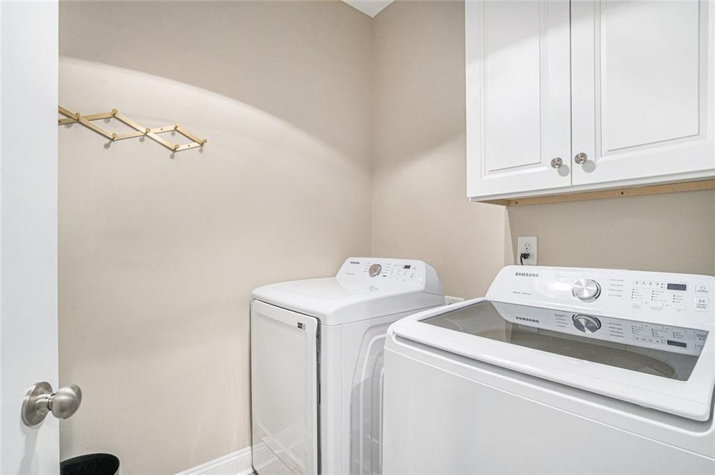 85 Jane Harris Road Dallas, GA 30157 - Photo 13 of 33 a utility room with dryer and washer