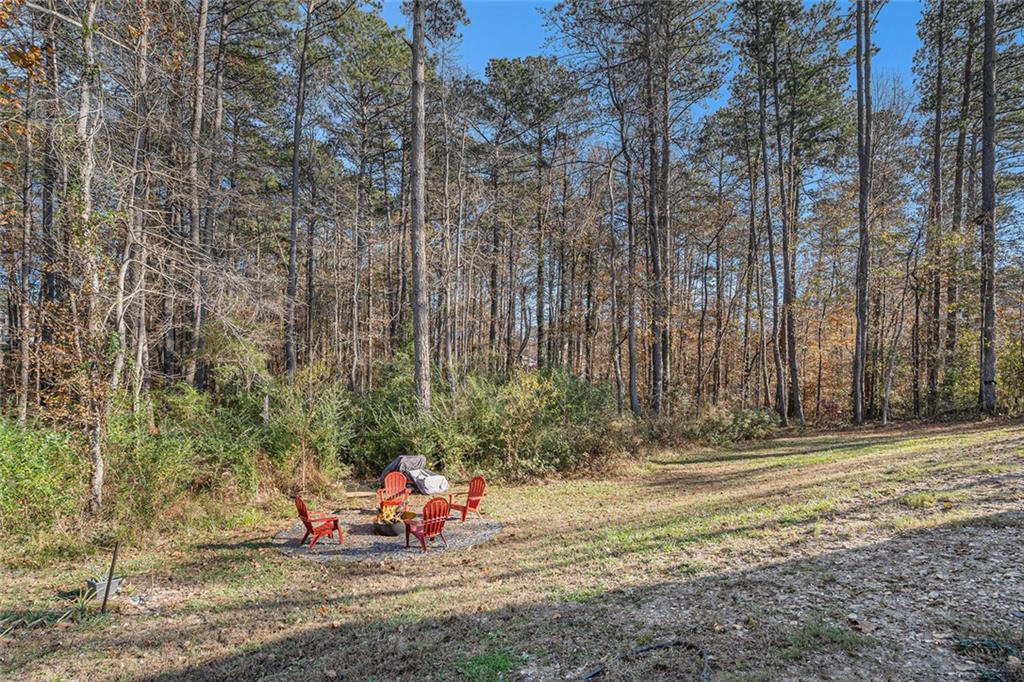 85 Jane Harris Road Dallas, GA 30157 - Photo 33 of 33 a view of a bench in a yard