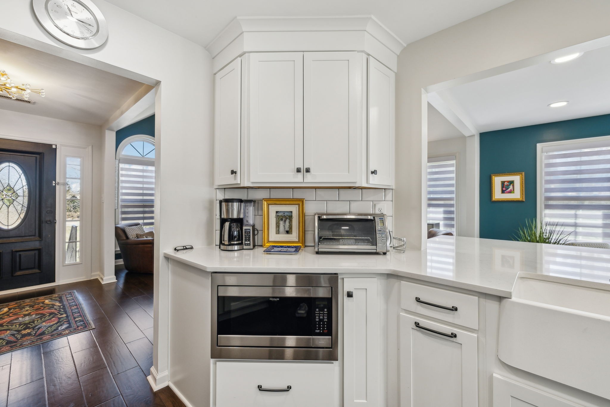 3920 Kedron Road Spring Hill, TN 37174 - Photo 23 of 40 a kitchen with stainless steel appliances granite countertop a stove a microwave and a refrigerator