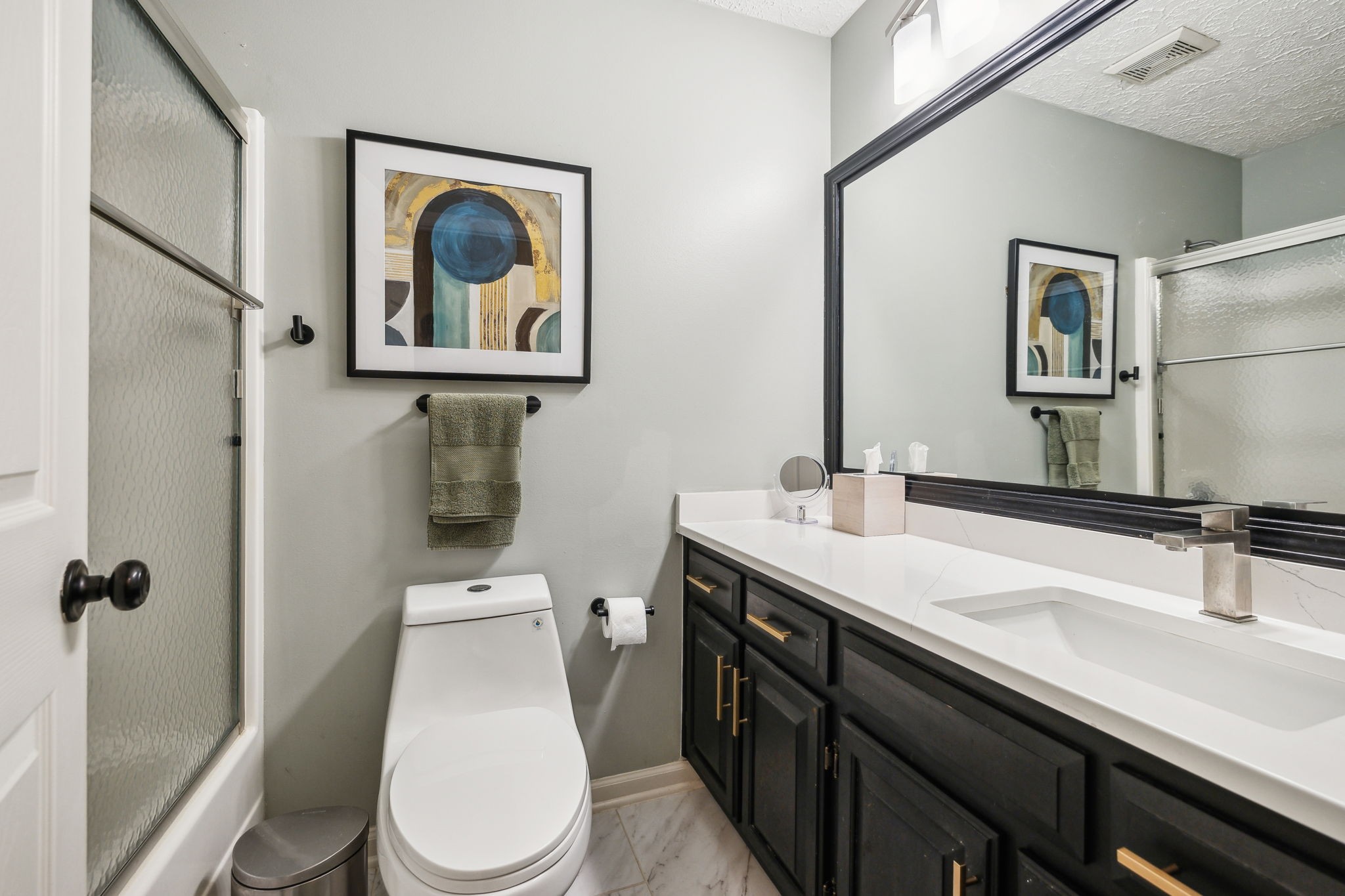 3920 Kedron Road Spring Hill, TN 37174 - Photo 29 of 40 a bathroom with a toilet a sink and mirror