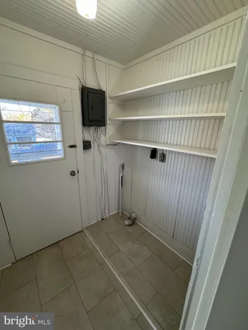 a view of a room with shelves