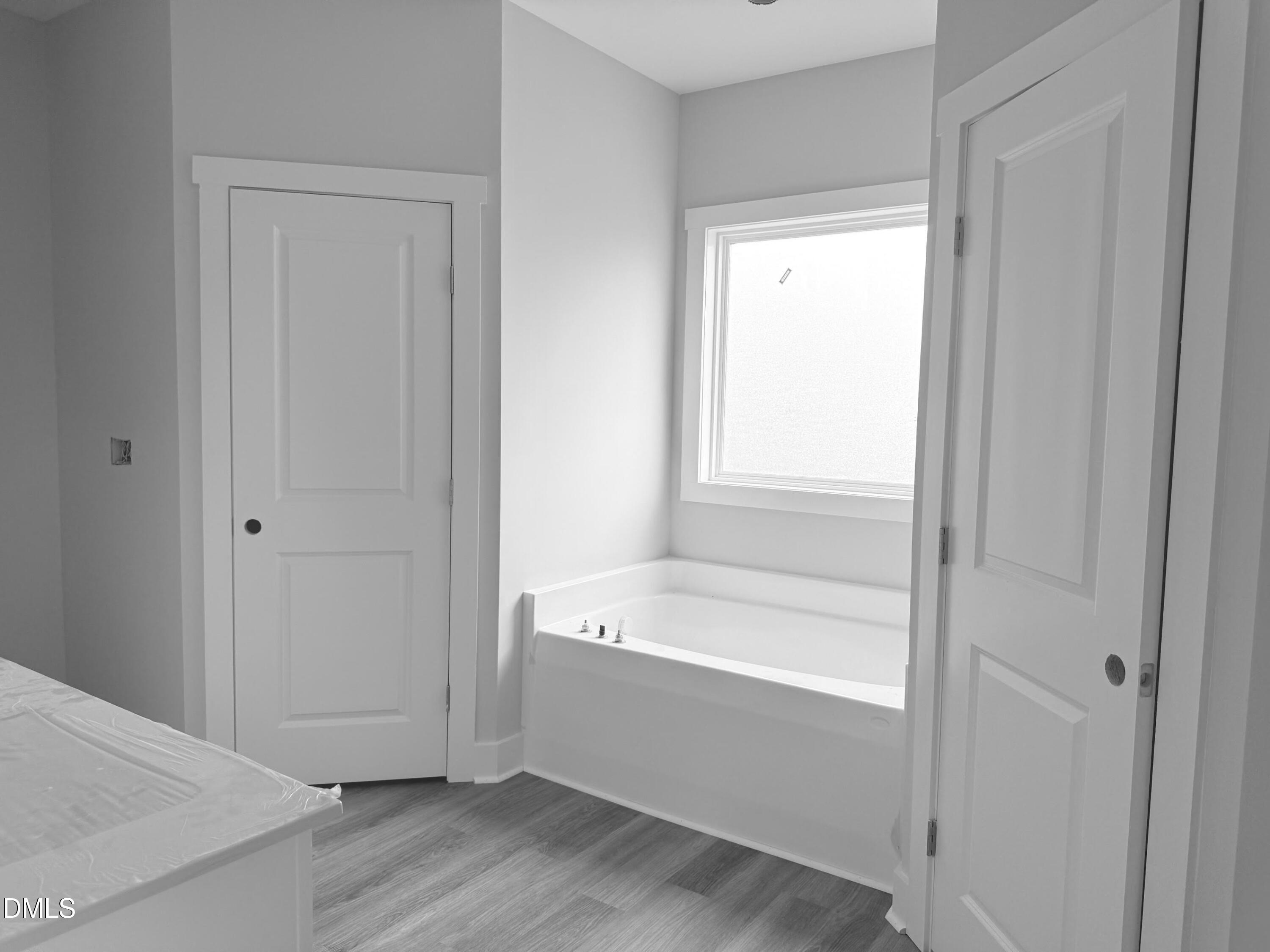 430 Chic Ennis Road Benson, NC 27504 - Photo 15 of 24 His/Her walkin closets