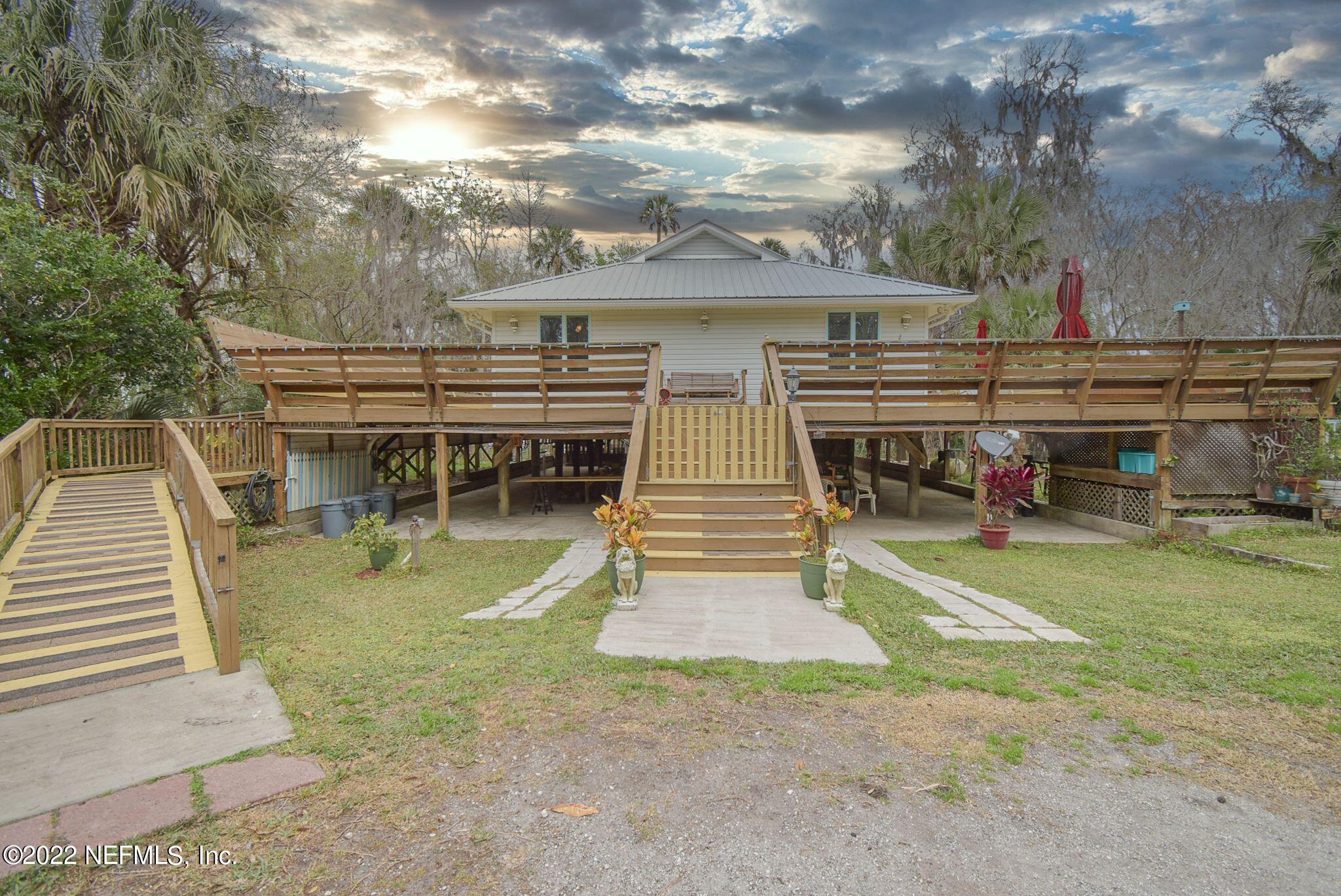 566 Clifton Road Crescent City, FL 32112 - Photo 3 of 41 a view of house with outdoor space