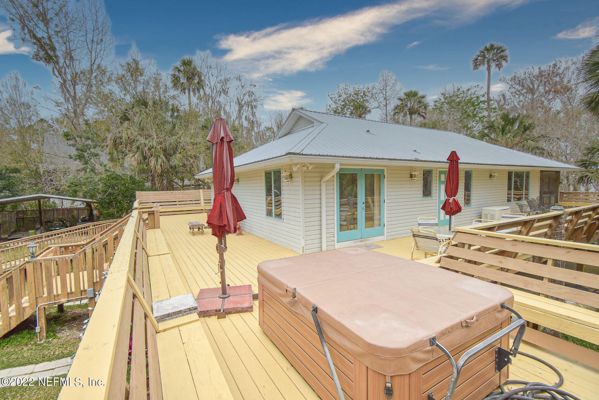 566 Clifton Road Crescent City, FL 32112 - Photo 4 of 41 a view of house with a swimming pool