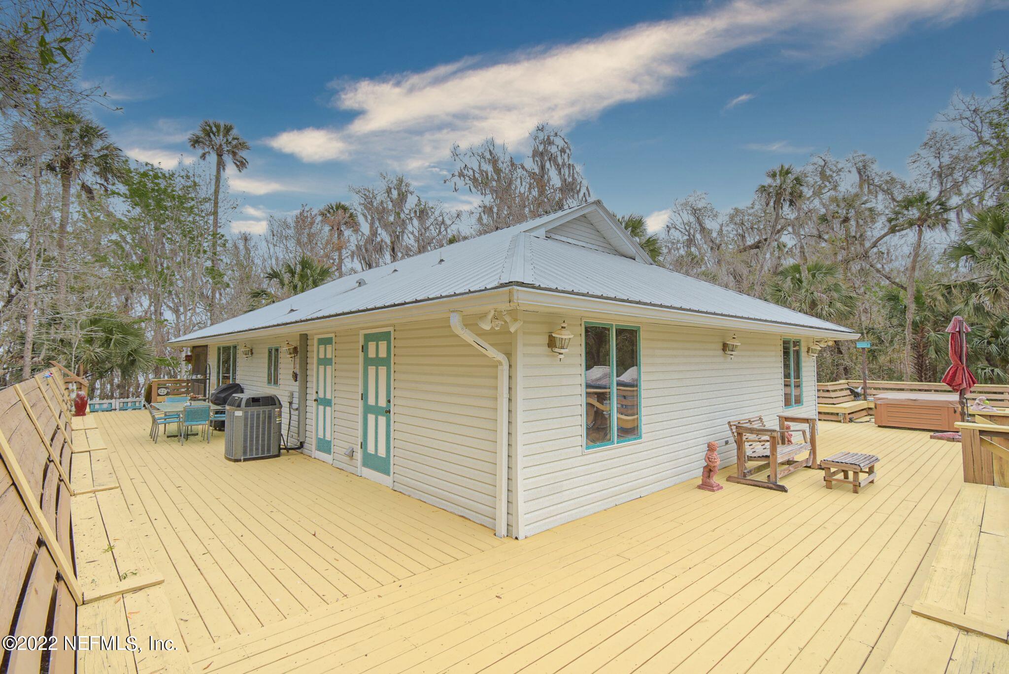 566 Clifton Road Crescent City, FL 32112 - Photo 5 of 41 a front view of a house with a yard