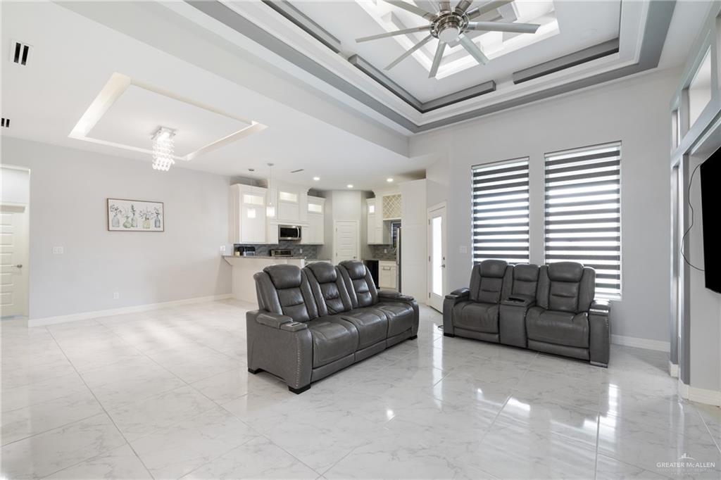 1422 South Esperanza Street Pharr, TX 78577 - Photo 3 of 16 a living room with furniture and a large window