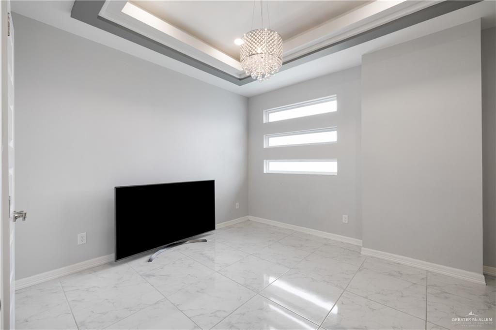 1422 South Esperanza Street Pharr, TX 78577 - Photo 10 of 16 a view of an empty room with a window