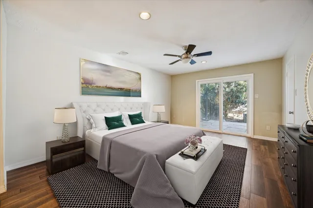 a bedroom with a bed and a couch