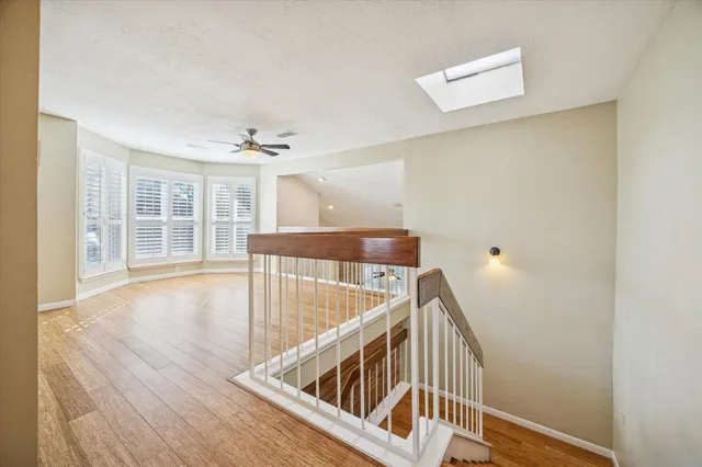 a view of an entryway with wooden floor