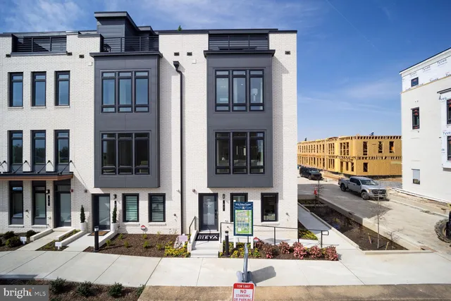 a front view of a building with street view