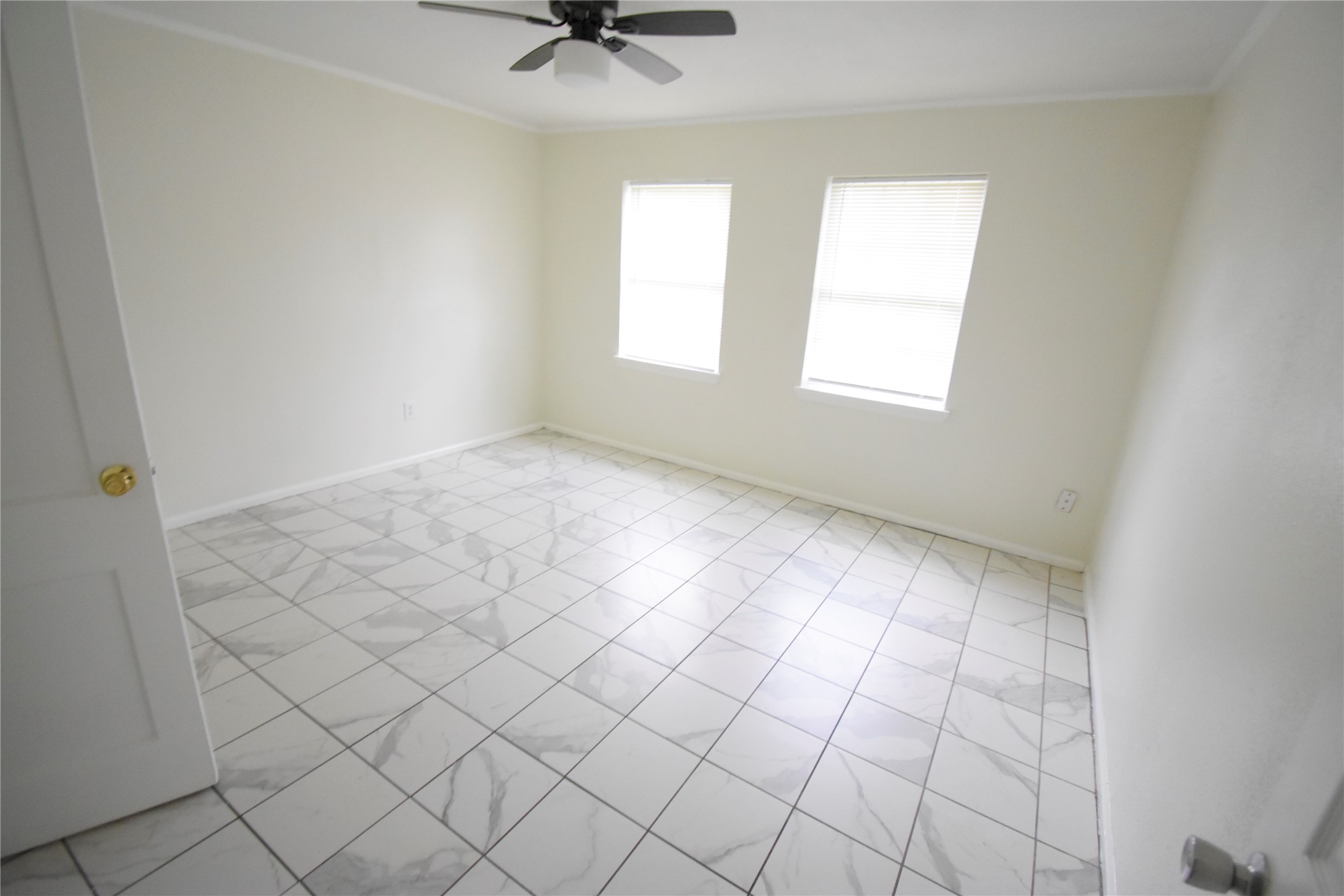 6229 Clover Ridge Street Houston, TX 77087 - Photo 21 of 25 an empty room with windows