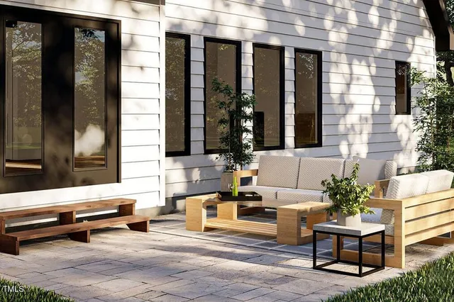 a living room with furniture and window