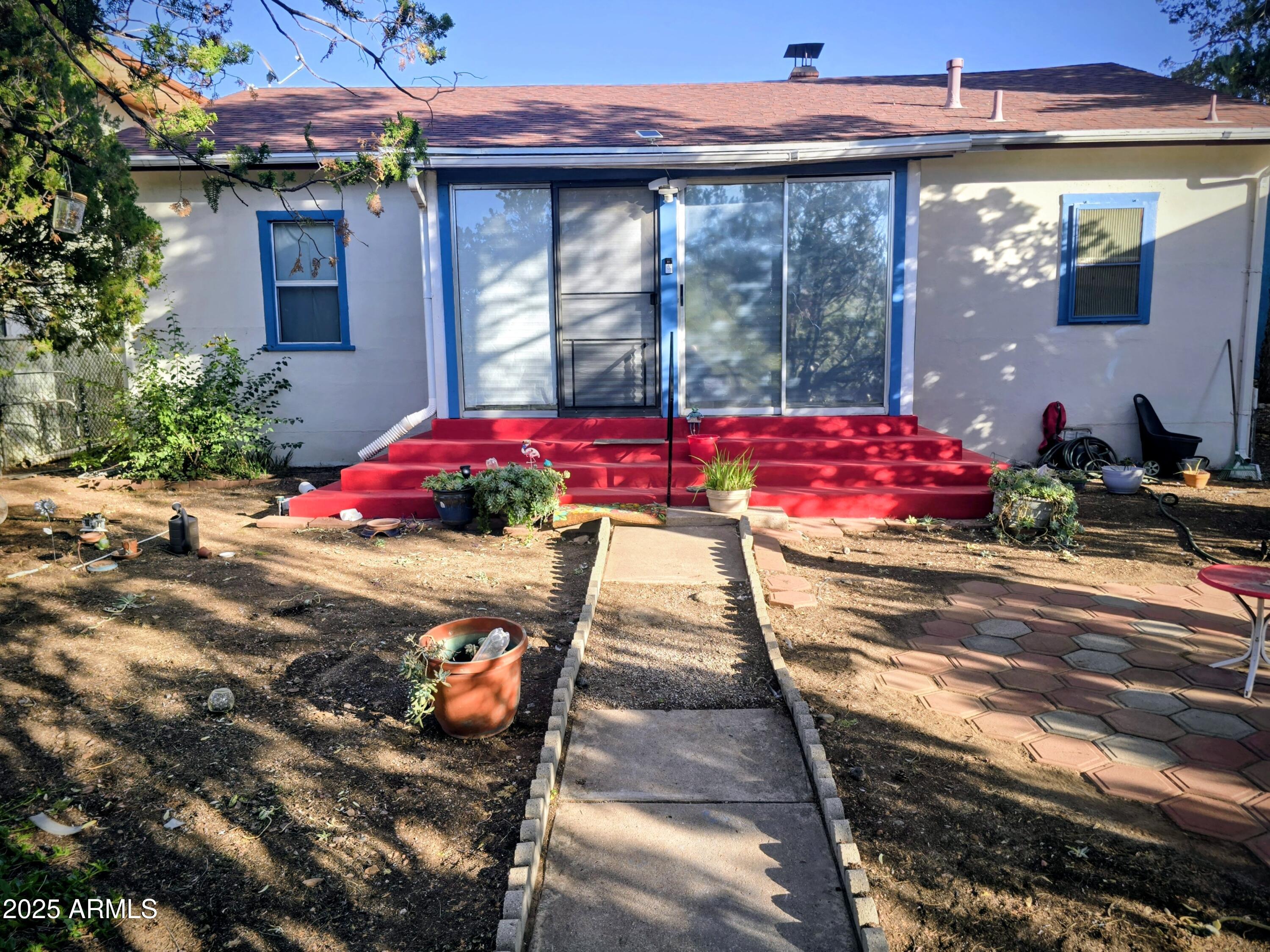 a view of a fireplace with a potted plant