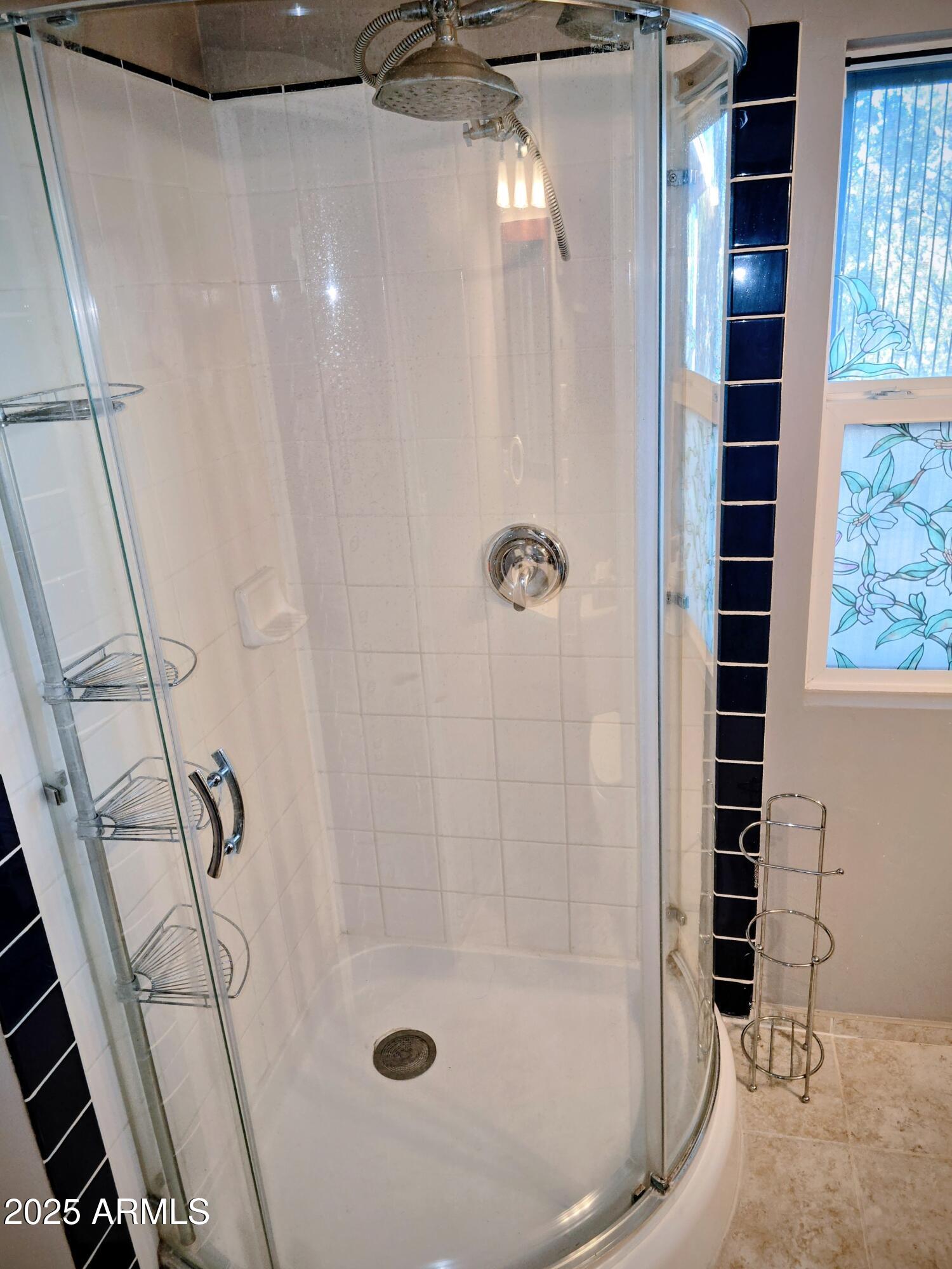 110 Arizona Street Bisbee, AZ 85603 - Photo 16 of 25 a bathroom with a shower