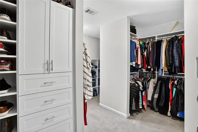 a view of outdoor space with playground and green space