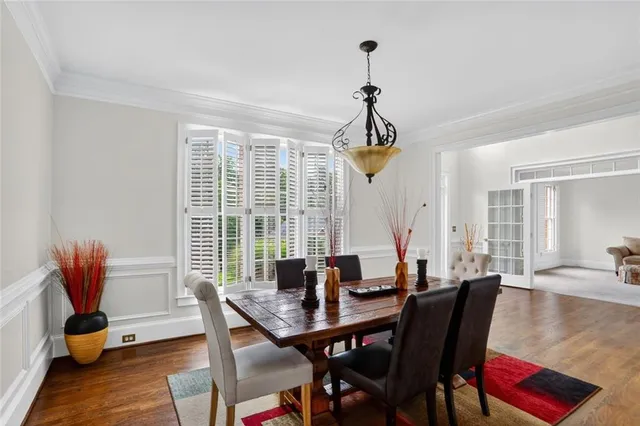 a living room with furniture fireplace and flat screen tv