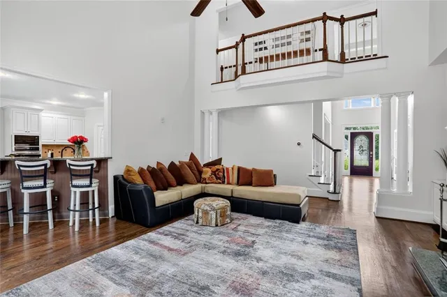 a spacious bedroom with a bed and a fireplace