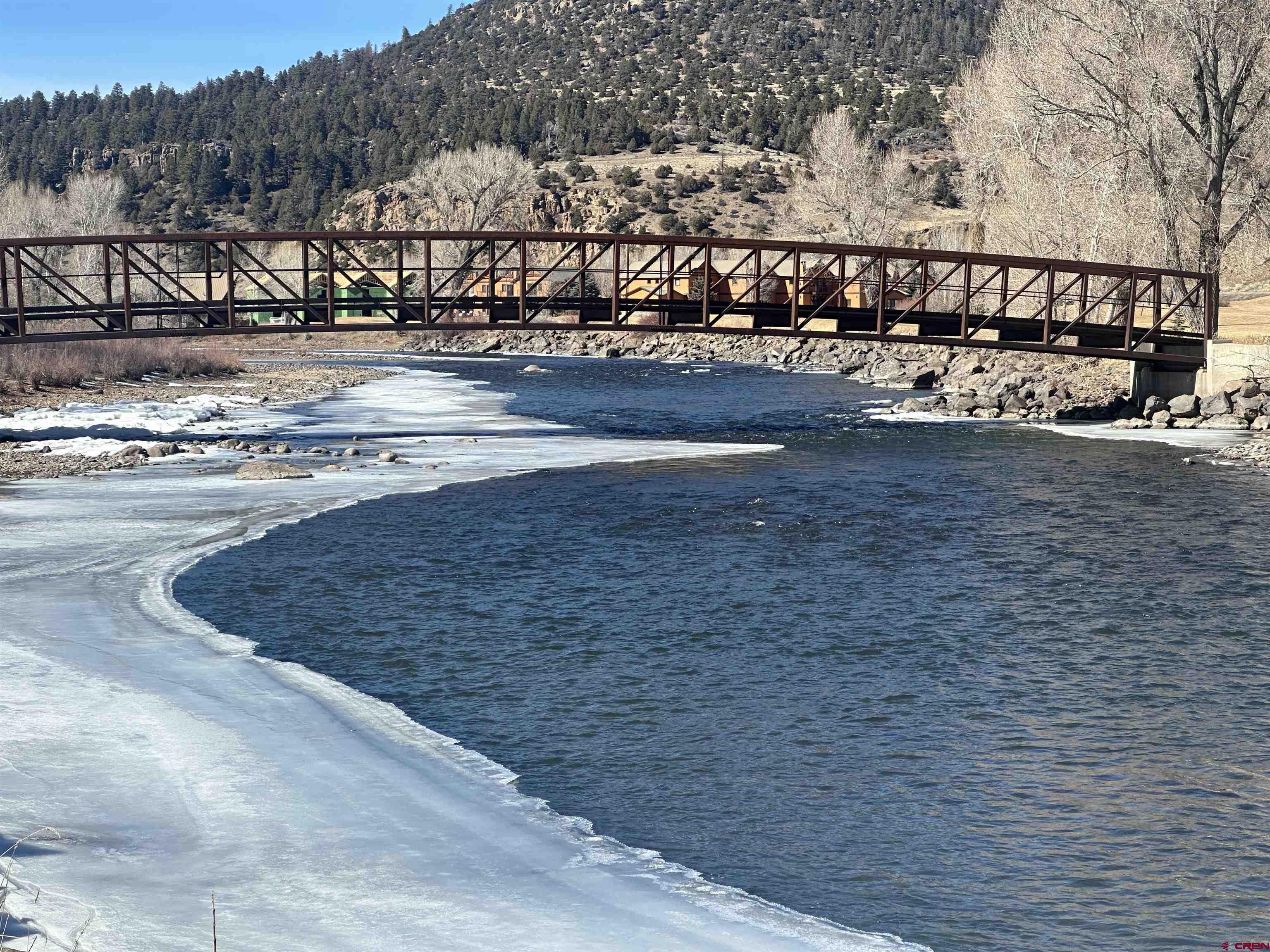 160 West Riverside Court South Fork, CO 81154 - Photo 13 of 16 a view of a swimming pool with an outdoor seating