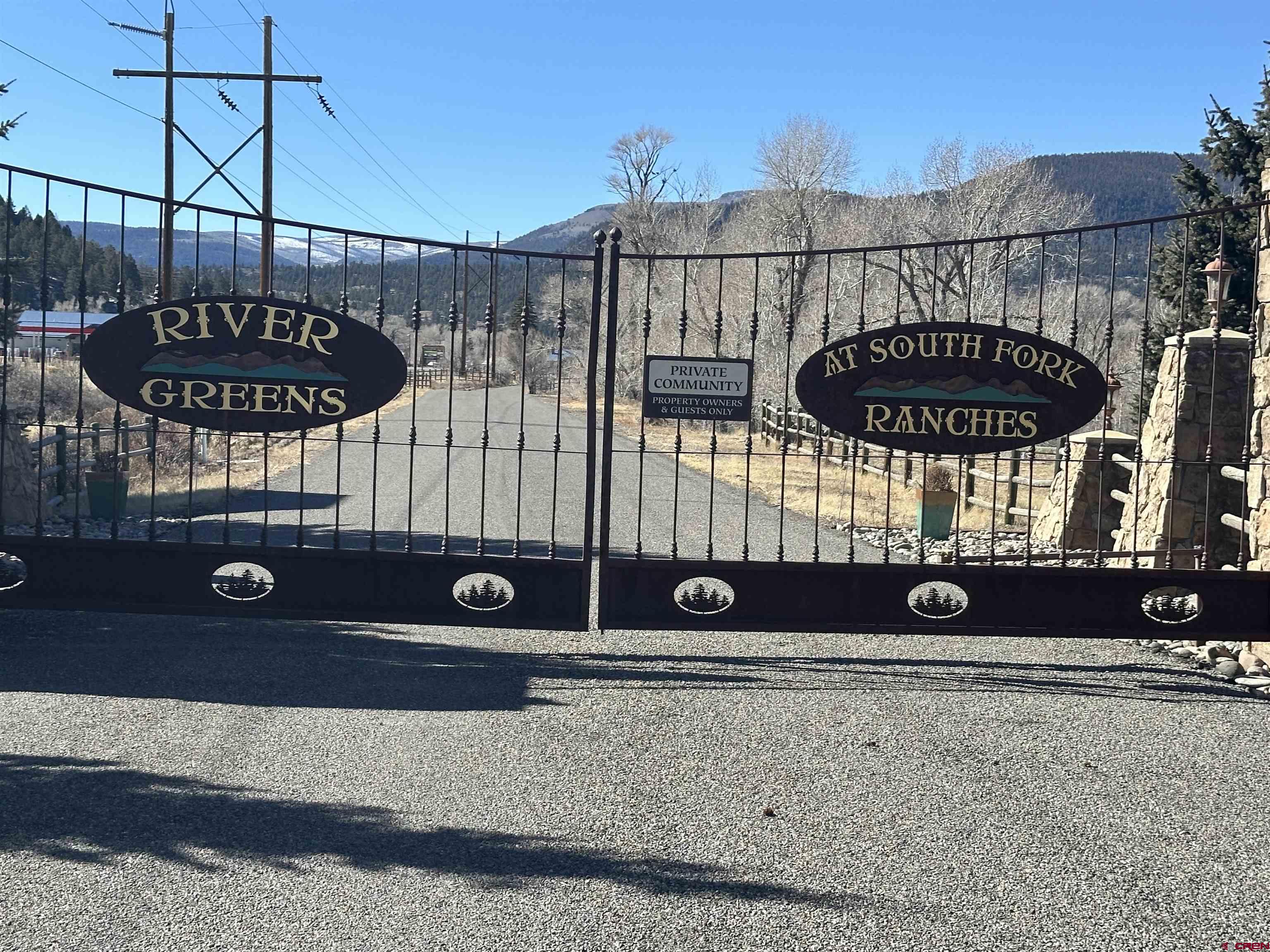 160 West Riverside Court South Fork, CO 81154 - Photo 2 of 16 a view of a door with a street