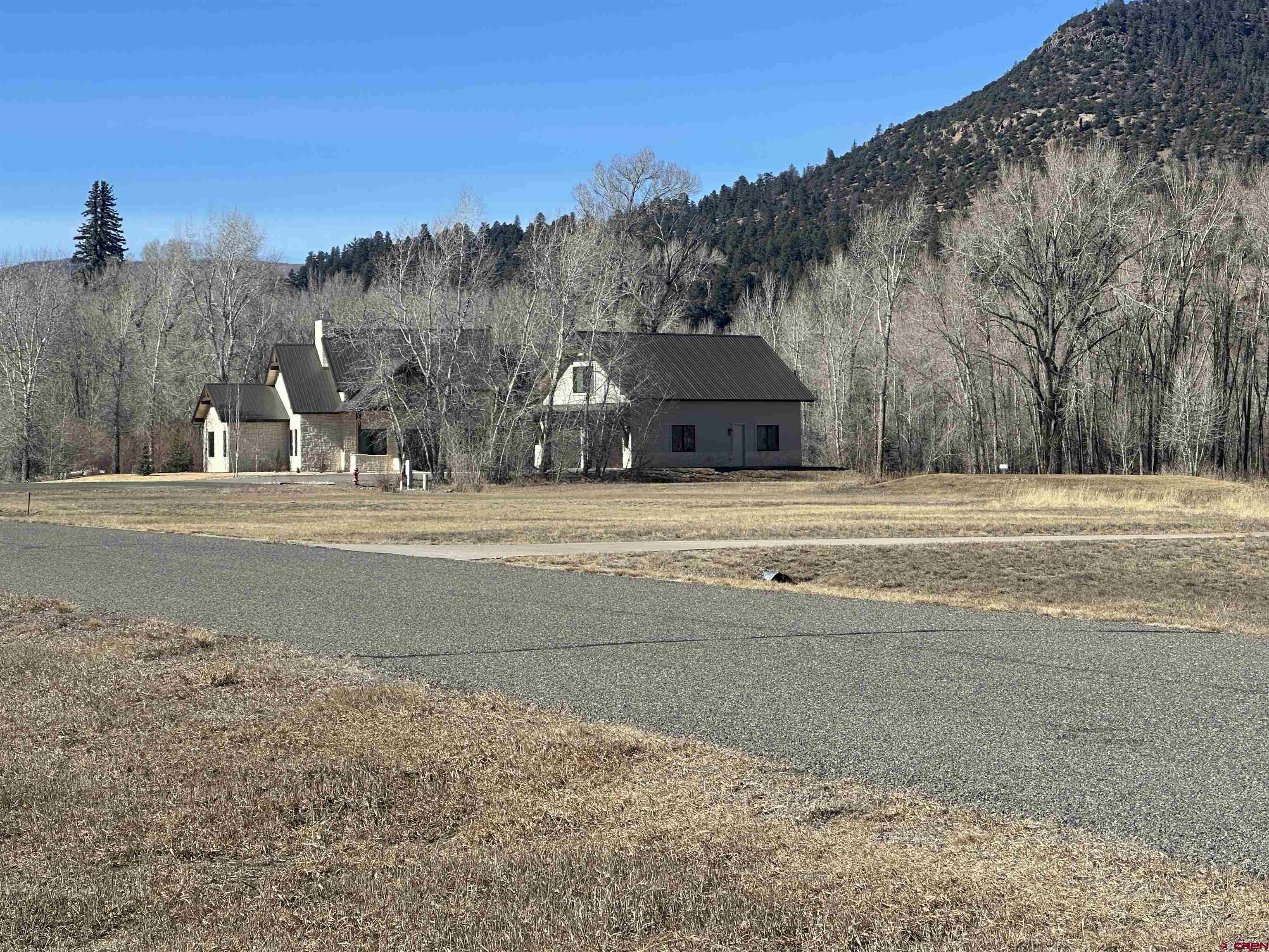 160 West Riverside Court South Fork, CO 81154 - Photo 5 of 16 a view of road with large trees
