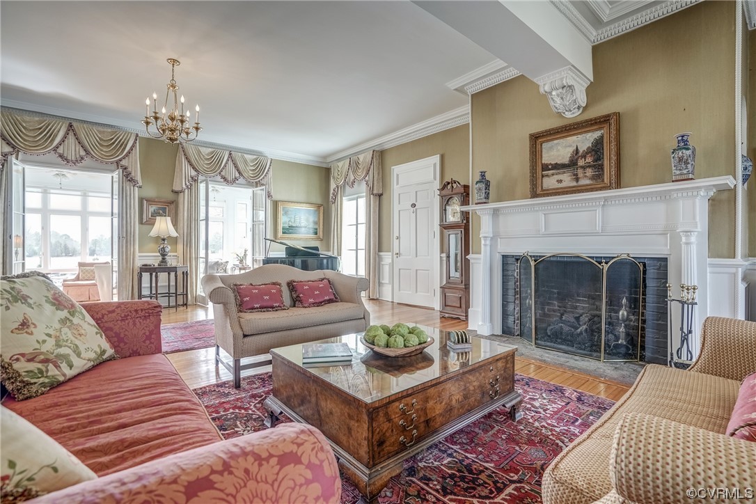 4750 Warner Hall Road Gloucester, VA 23061 - Photo 16 of 49 a living room with furniture and a fireplace