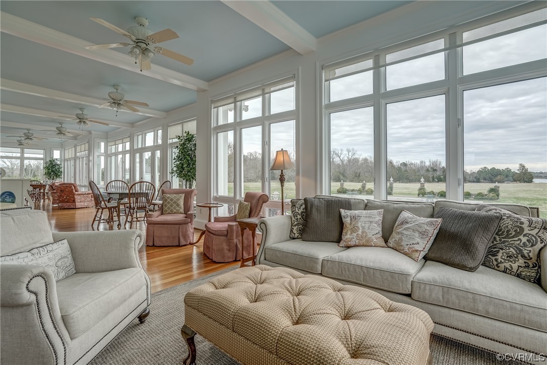 4750 Warner Hall Road Gloucester, VA 23061 - Photo 19 of 49 a living room with furniture and a large window