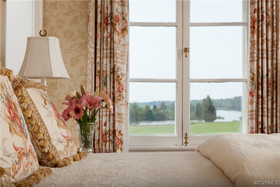 4750 Warner Hall Road Gloucester, VA 23061 - Photo 28 of 49 a living room filled with furniture and a table