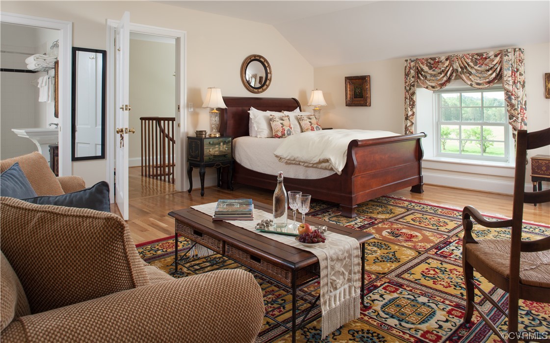 4750 Warner Hall Road Gloucester, VA 23061 - Photo 36 of 49 a bedroom with furniture and a window