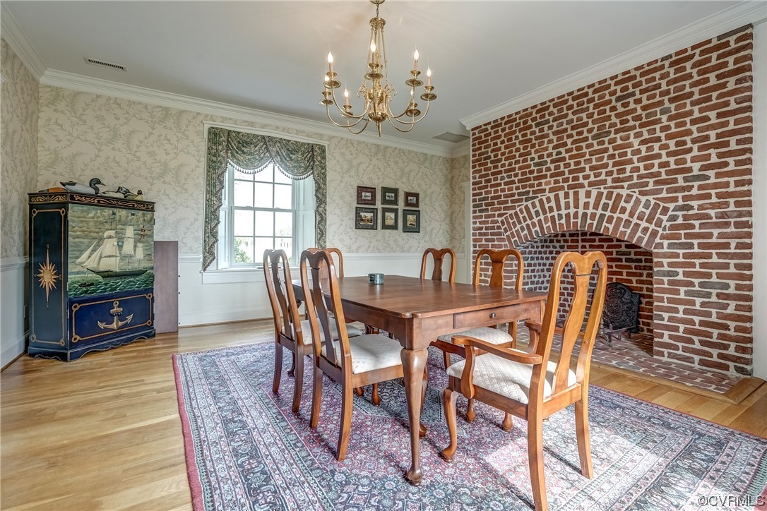 4750 Warner Hall Road Gloucester, VA 23061 - Photo 37 of 49 a view of a dining room with furniture