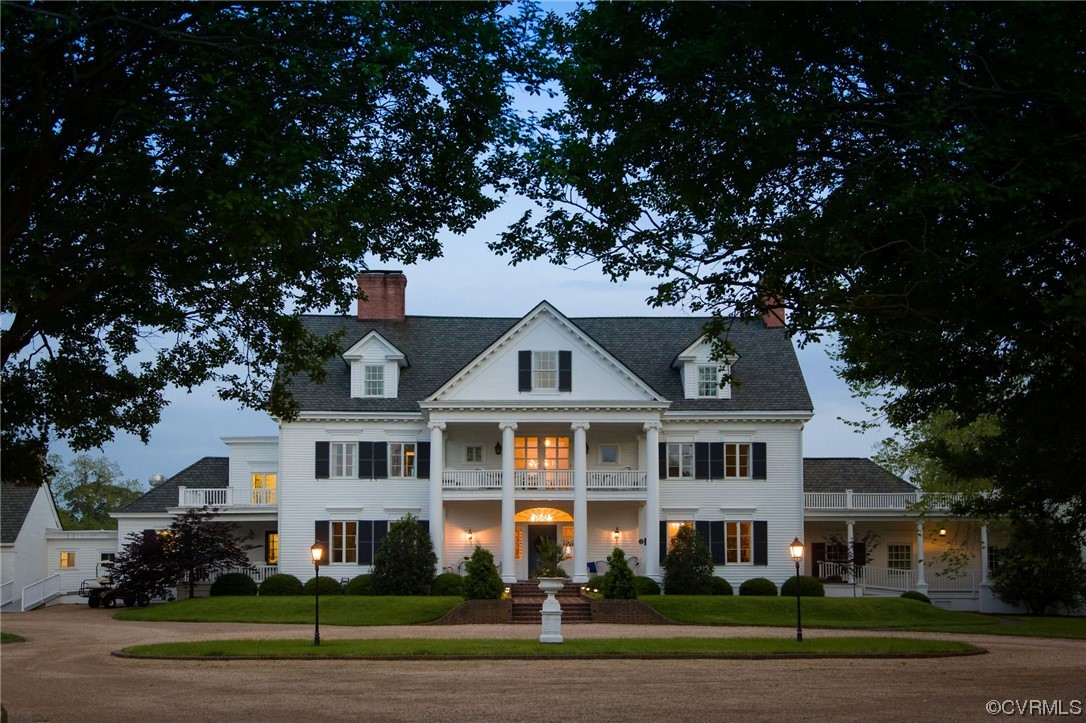 4750 Warner Hall Road Gloucester, VA 23061 - Photo 39 of 49 a front view of a house with a garden