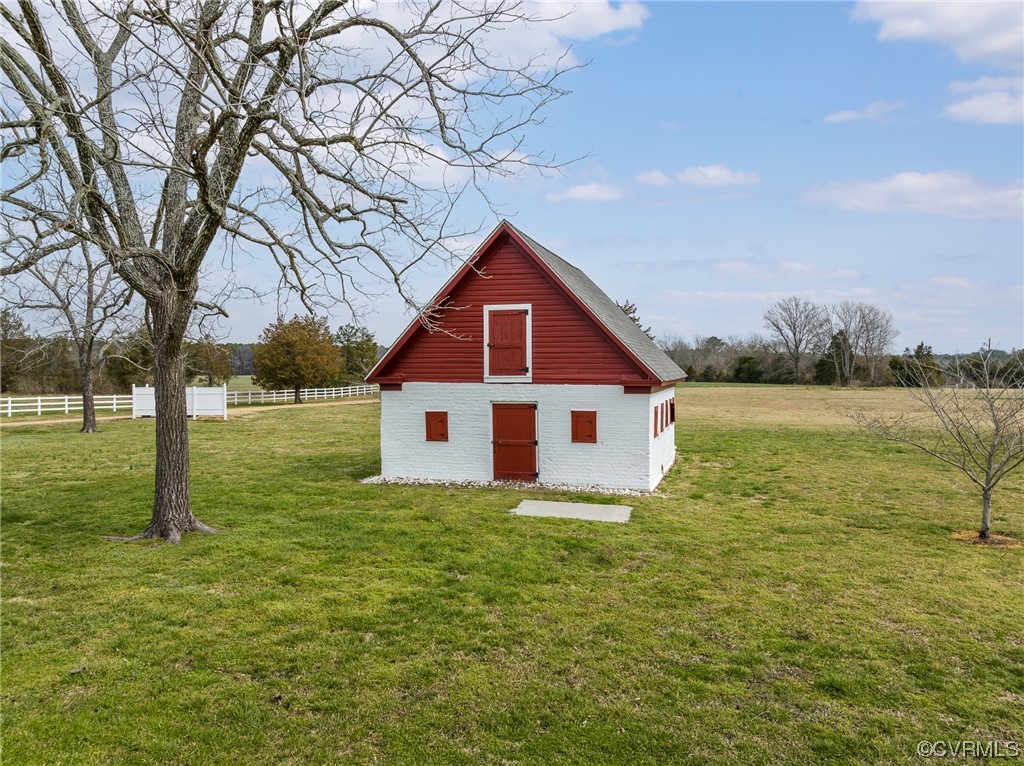 4750 Warner Hall Road Gloucester, VA 23061 - Photo 49 of 49 a view of a house with a yard