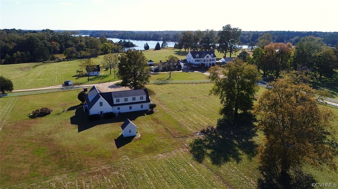 4750 Warner Hall Road Gloucester, VA 23061 - Photo 6 of 49 a view of a swimming pool with a yard