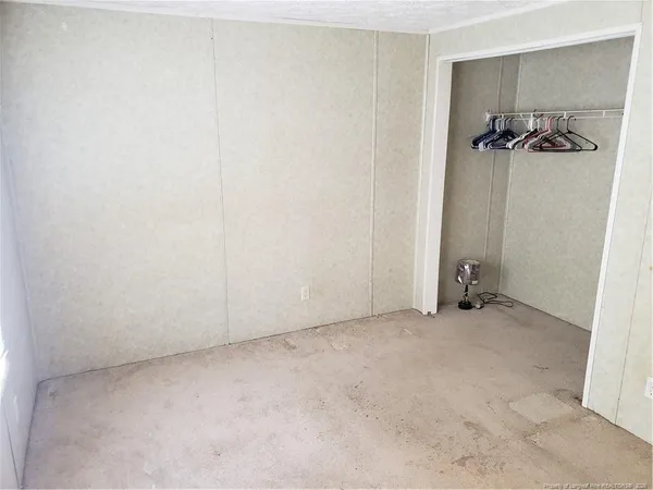 a utility room with cabinets