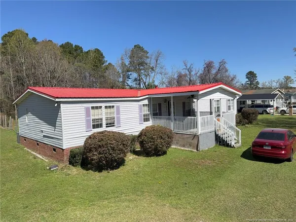 a view of backyard of house