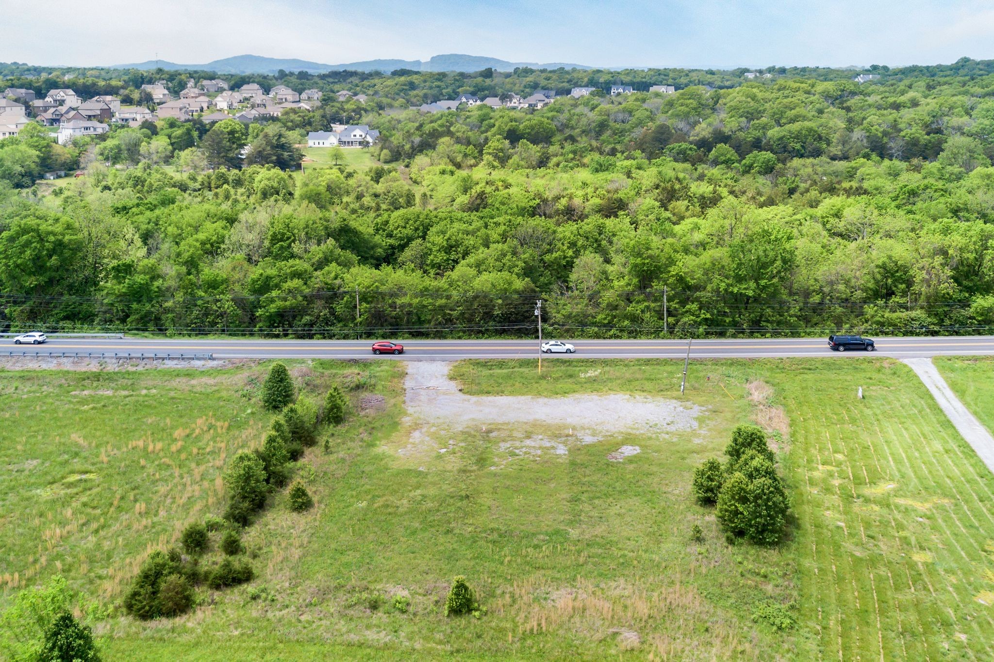 0 Nolensville Road Brentwood, TN 37027 - Photo 15 of 27 a view of a swimming pool with a yard
